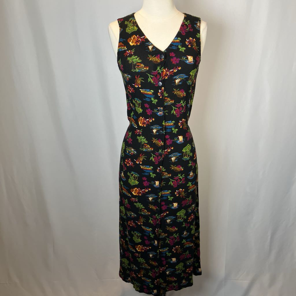 Colorful patterned dress on a mannequin against a plain background