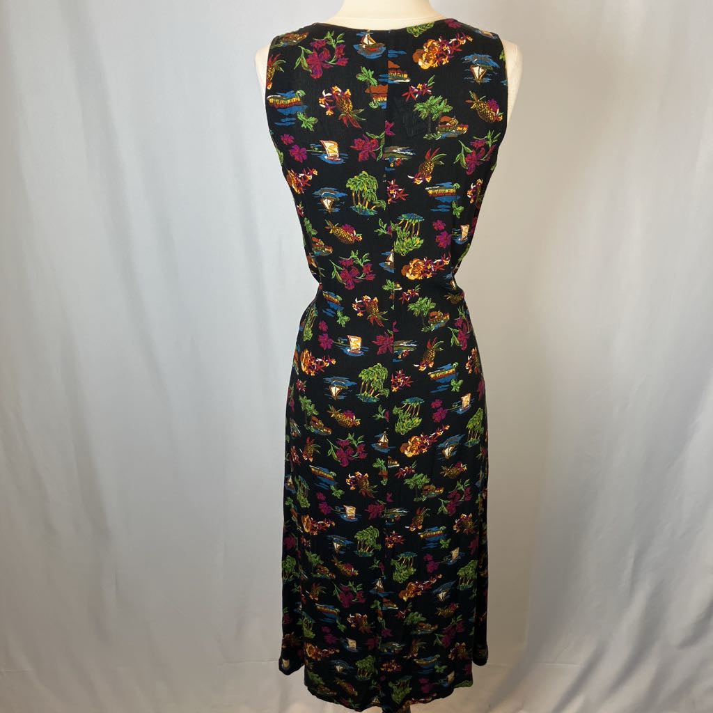 Colorful patterned dress on a mannequin against a plain background