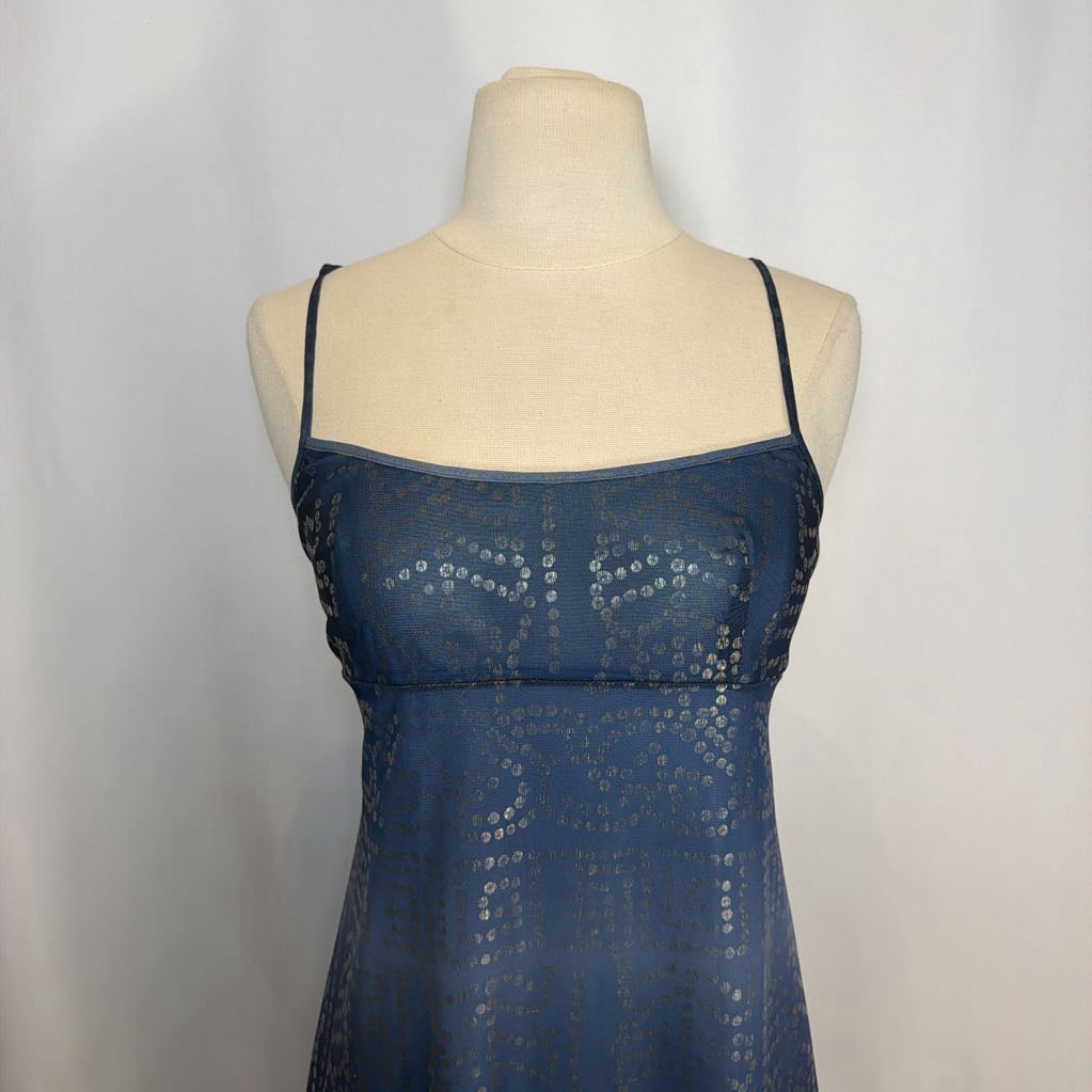 Blue sequin dress on a mannequin against a white background
