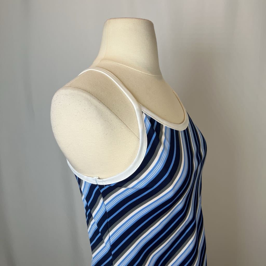 Mannequin wearing a blue and white striped dress with a beige hat on a plain background