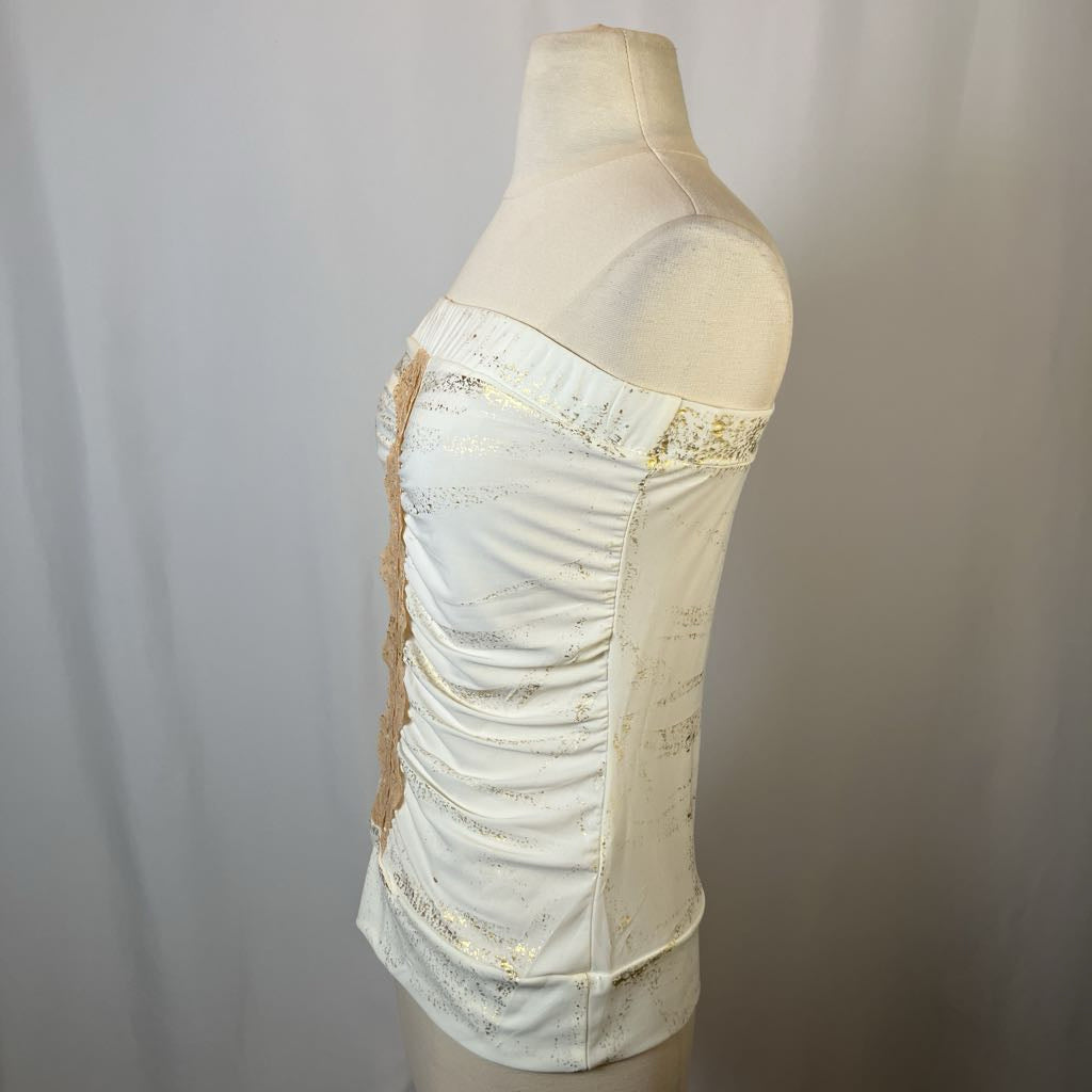 White off-shoulder top with lace details on a mannequin against a plain background