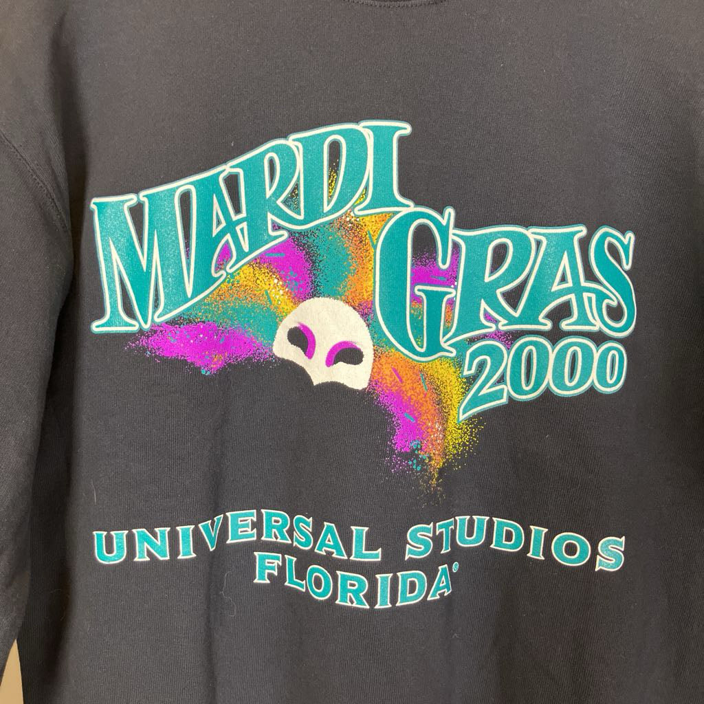 Black sweatshirt with Mardi Gras 2000 design featuring colorful text and a skull, Universal Studios Florida branding.