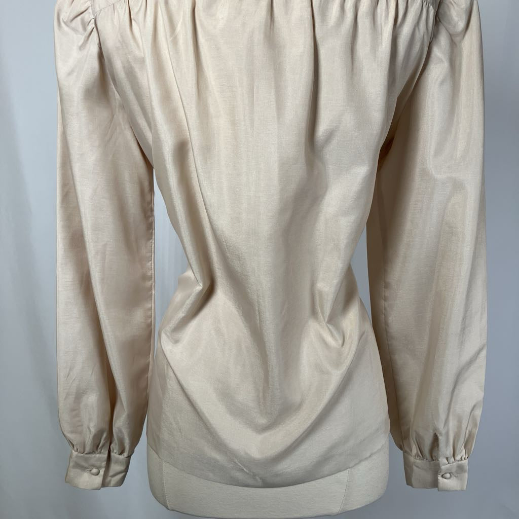 Beige jacket on a plain background