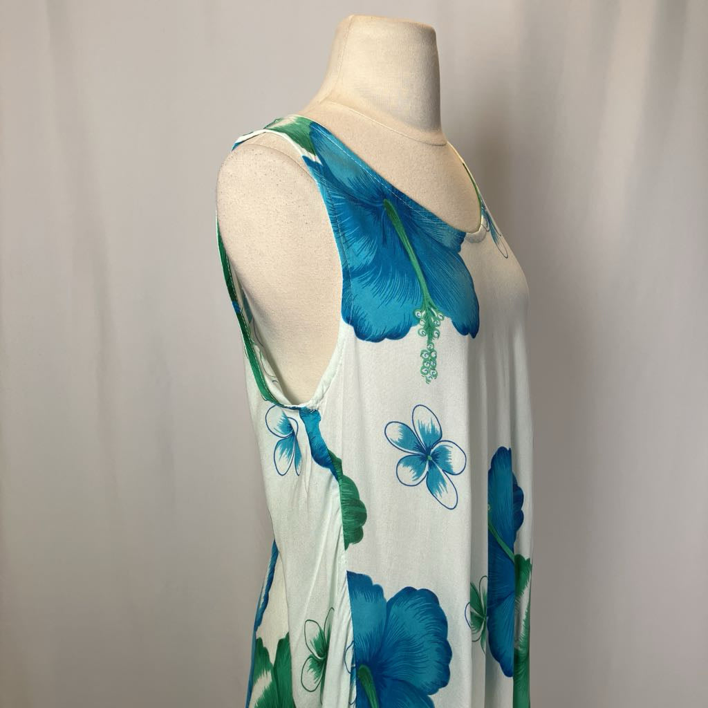 Floral dress on a mannequin against a plain background