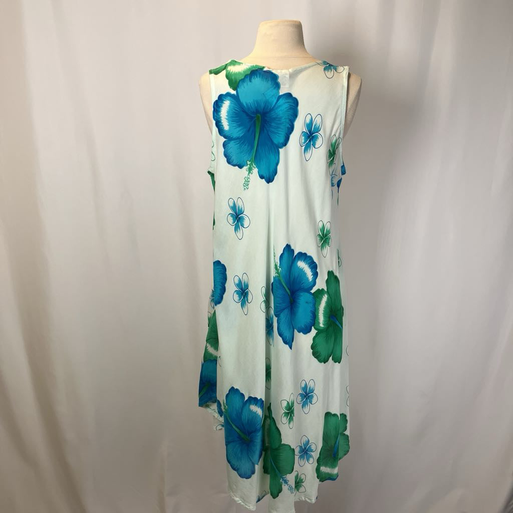 White dress with blue floral patterns on a mannequin against a white background