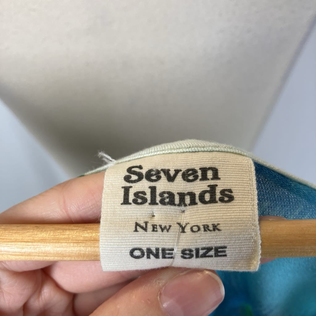 Label with 'Seven Islands New York One Size' text on a product tag.