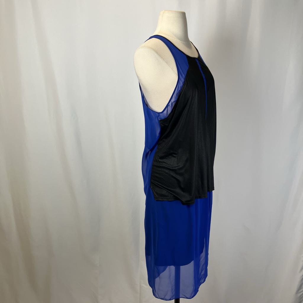 Mannequin wearing a blue and black dress against a white background