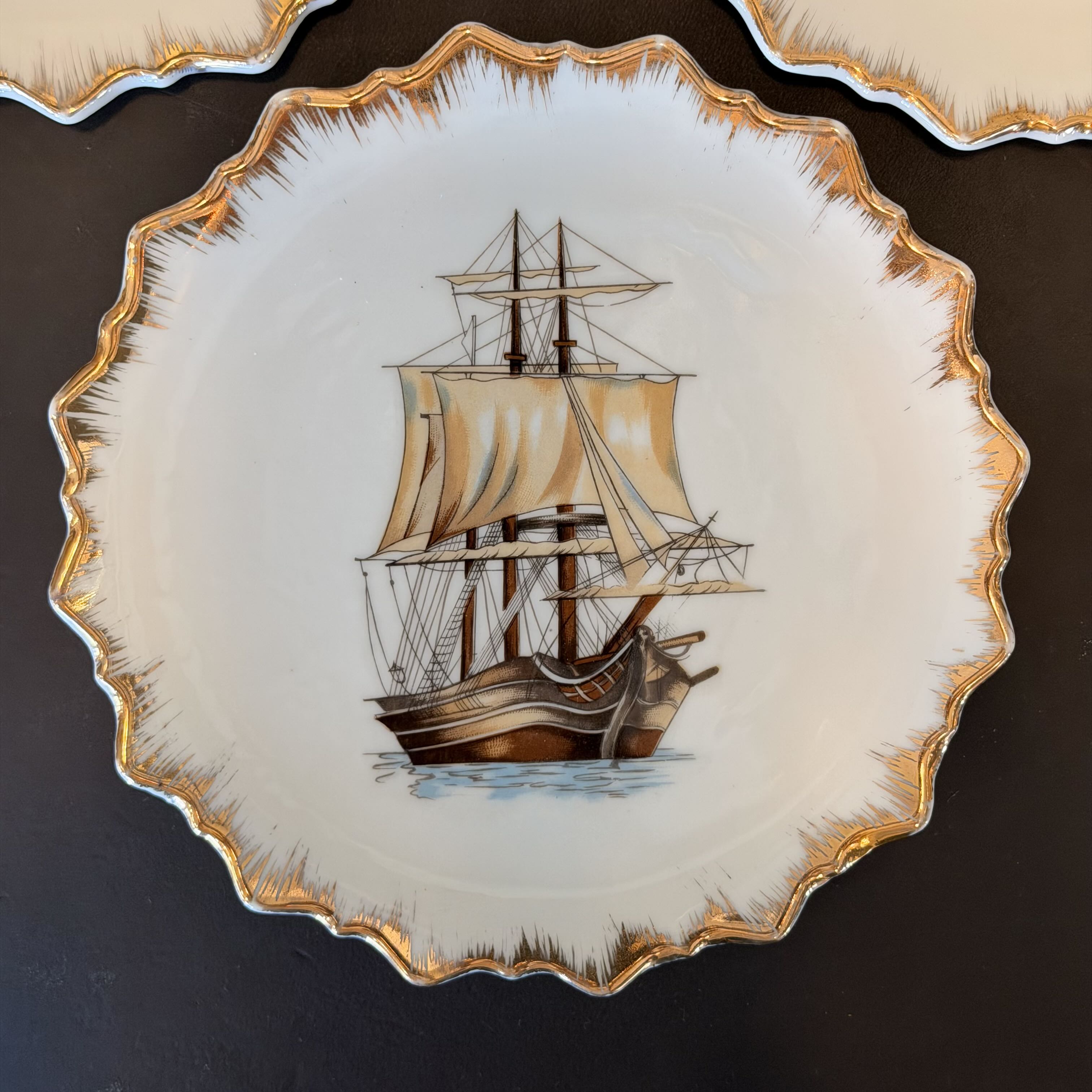 Decorative plate with a ship design on a white background