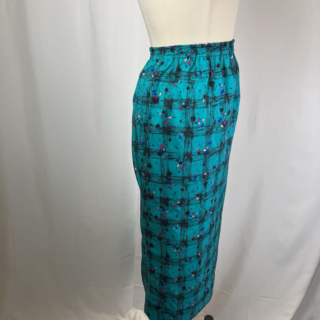 Teal plaid skirt on a mannequin against a plain background