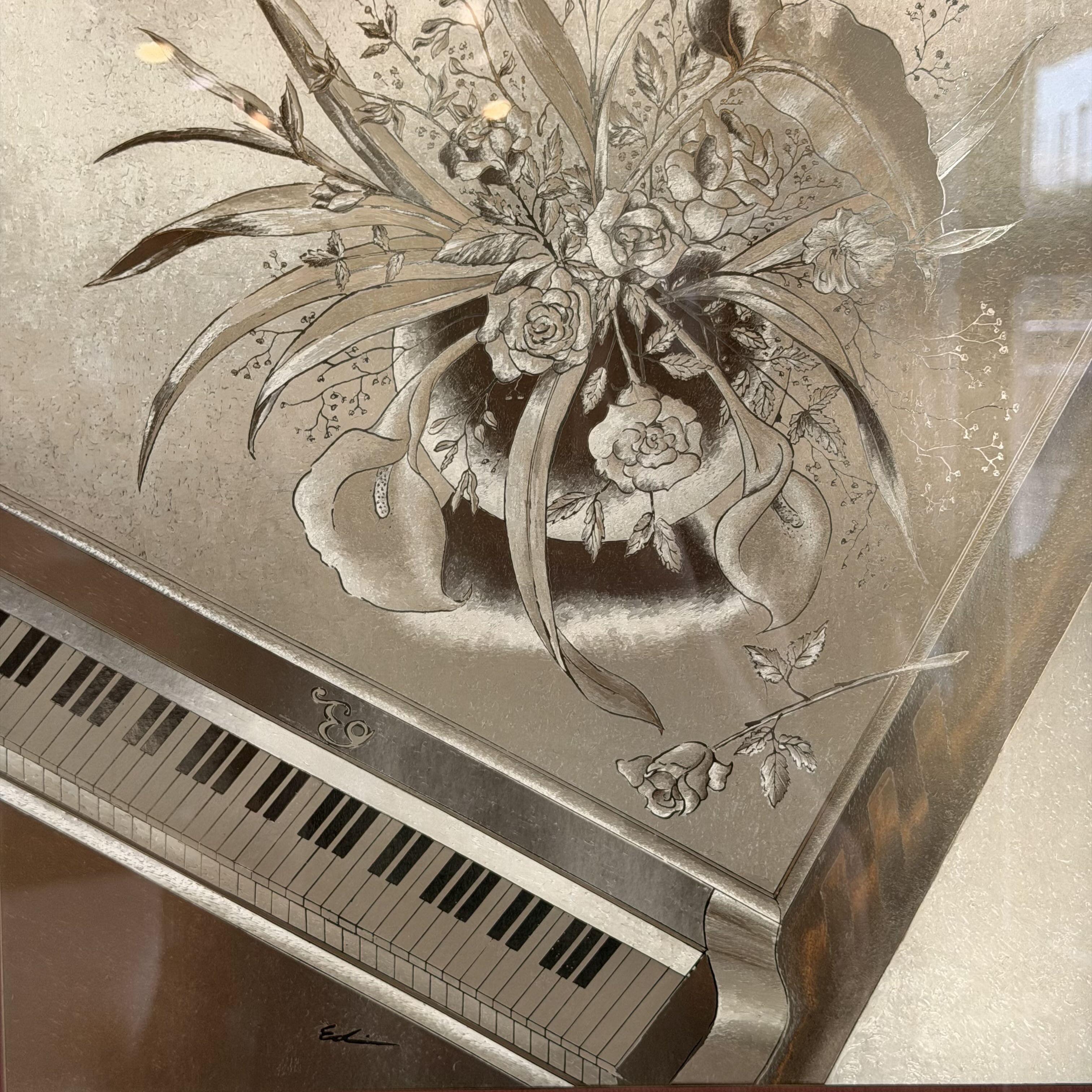 art decor of bronze gold piano with flowers on top