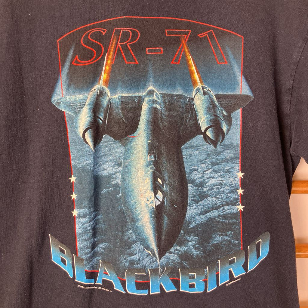 Black t-shirt with SR-71 Blackbird graphic design on a plain background