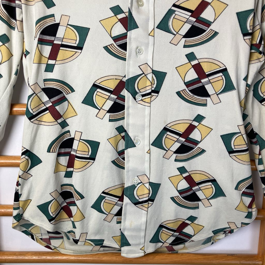 Shirt with geometric pattern on a wooden rack