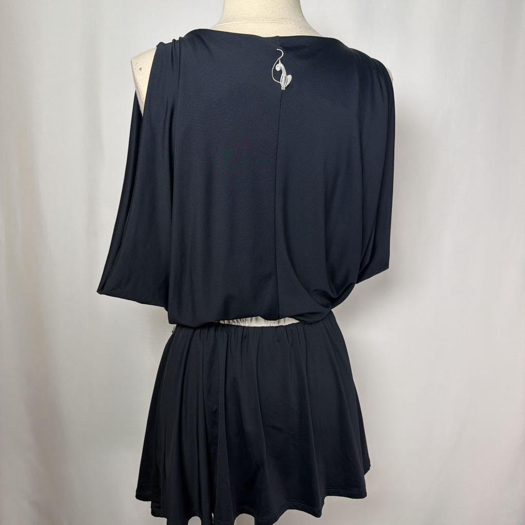back of black dress with cat logo