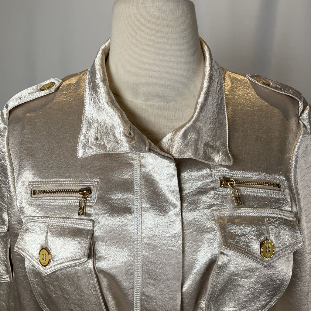 Silver metallic jacket on a mannequin with a plain background