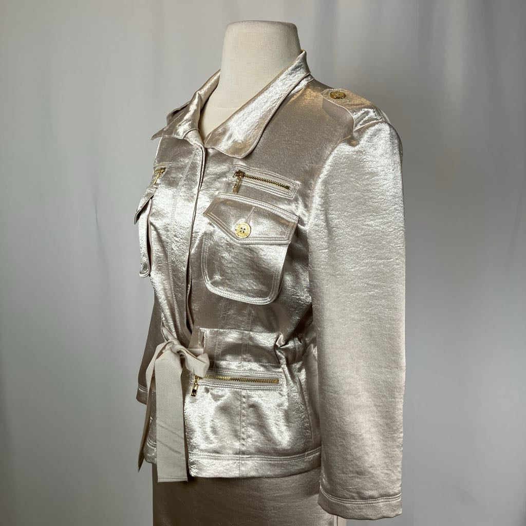 Silver metallic jacket on a mannequin against a gray background