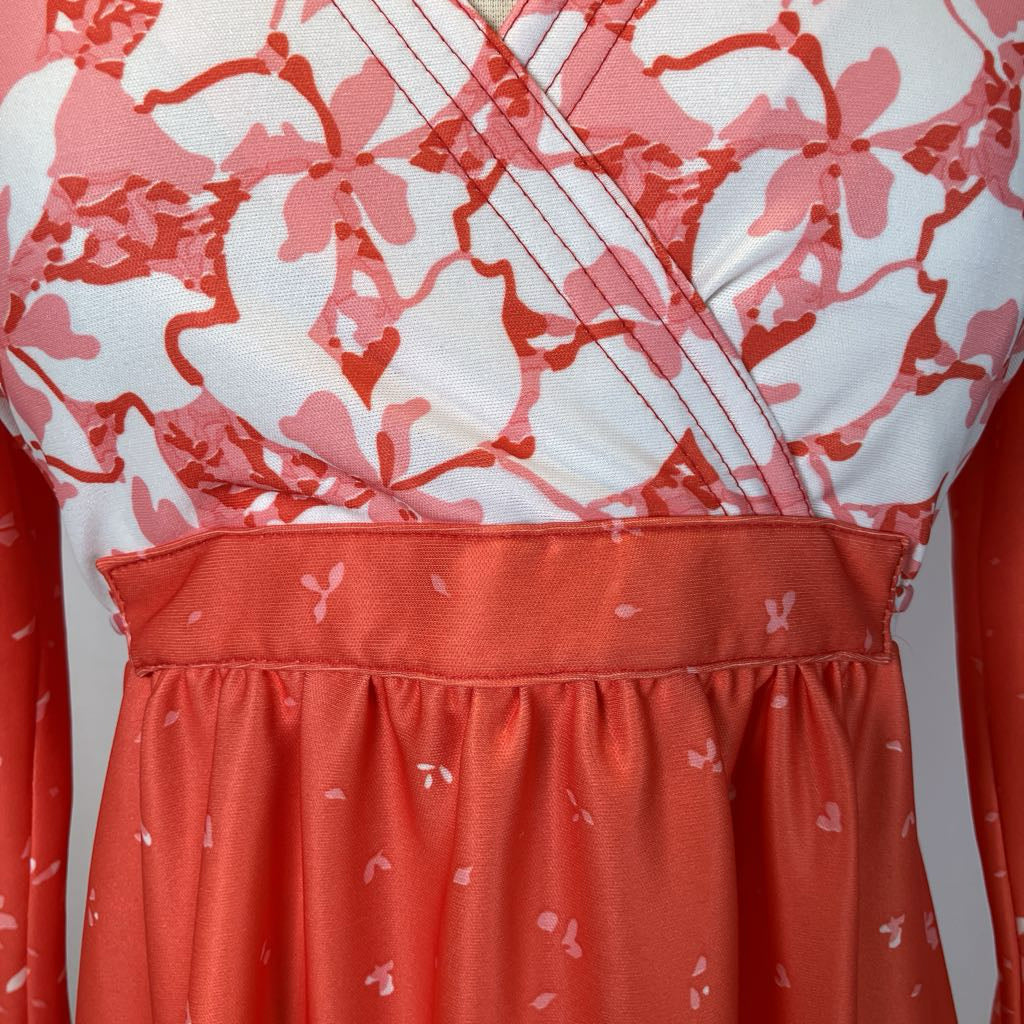 Closeup of the waist and design on the bust of the dress