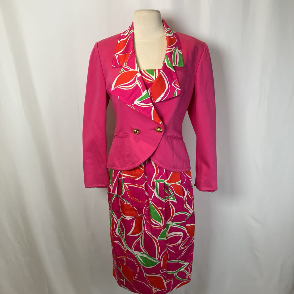 Skirt suit on mannequin with simple white background