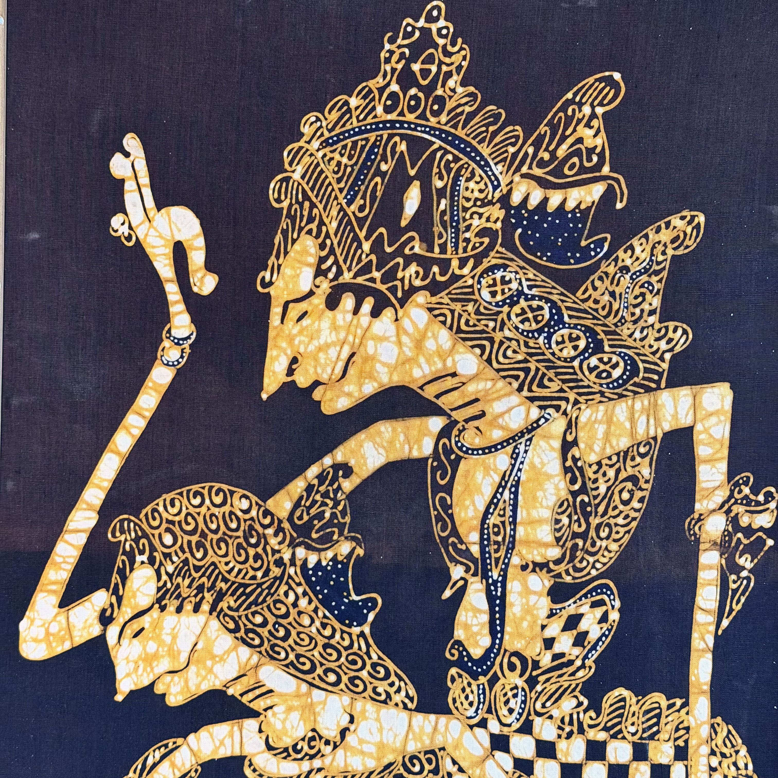 Decorative illustration of a warrior on a horse with intricate patterns on a dark background