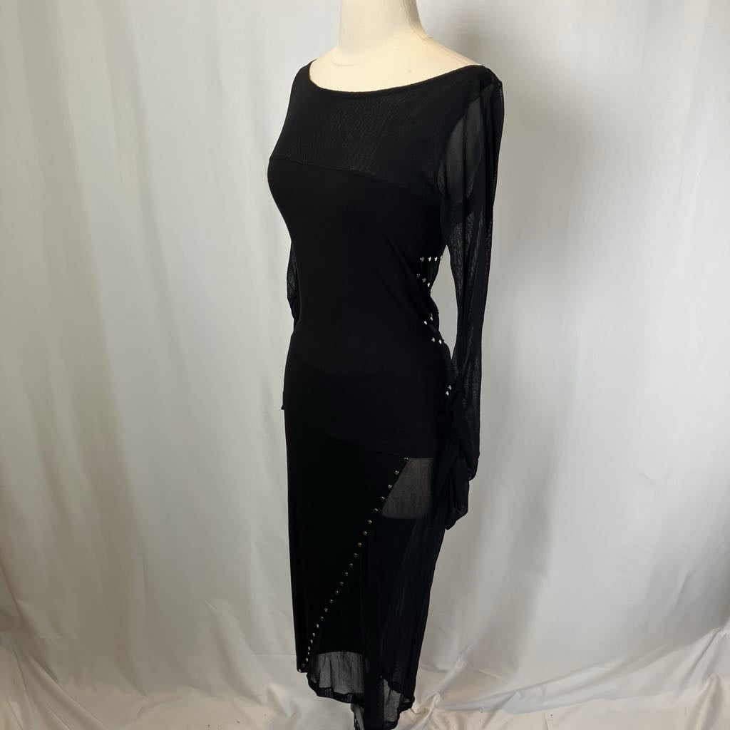 Black two piece on a mannequin against a plain background