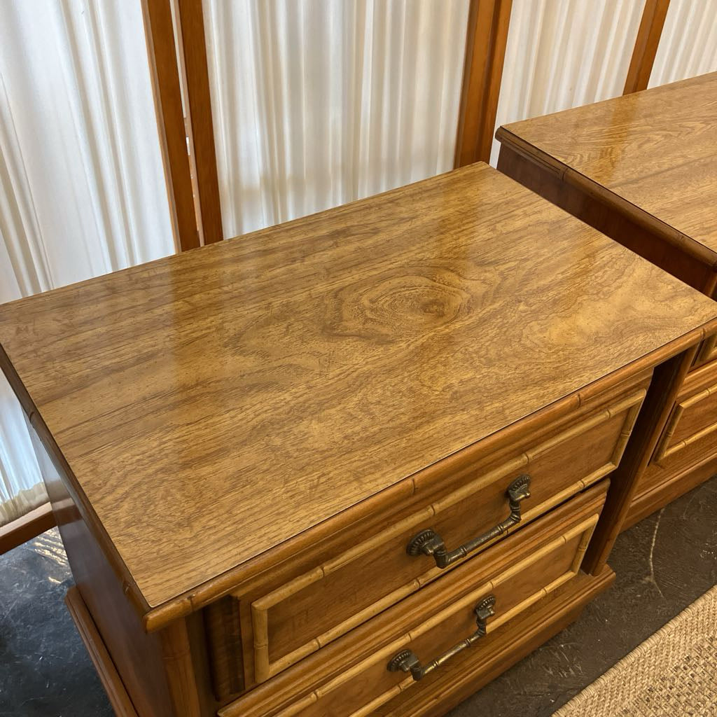Wooden dresser with drawers in a room with curtains