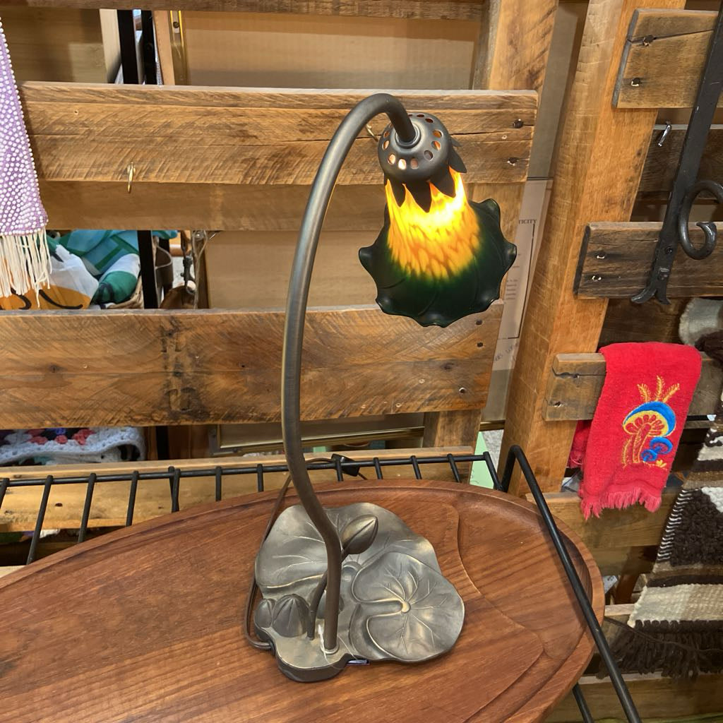 Decorative lamp with a unique design on a wooden surface