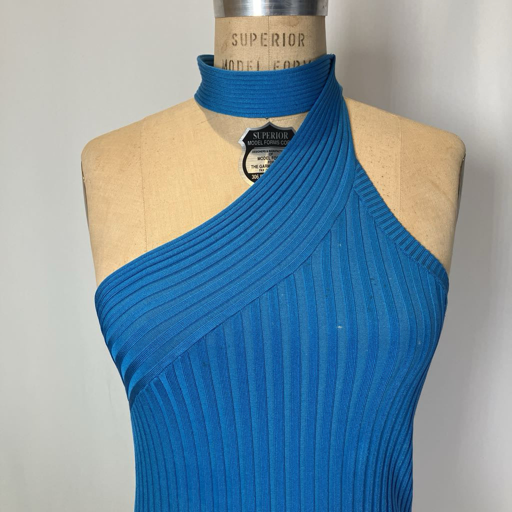 Blue ribbed dress on a mannequin with a gray background
