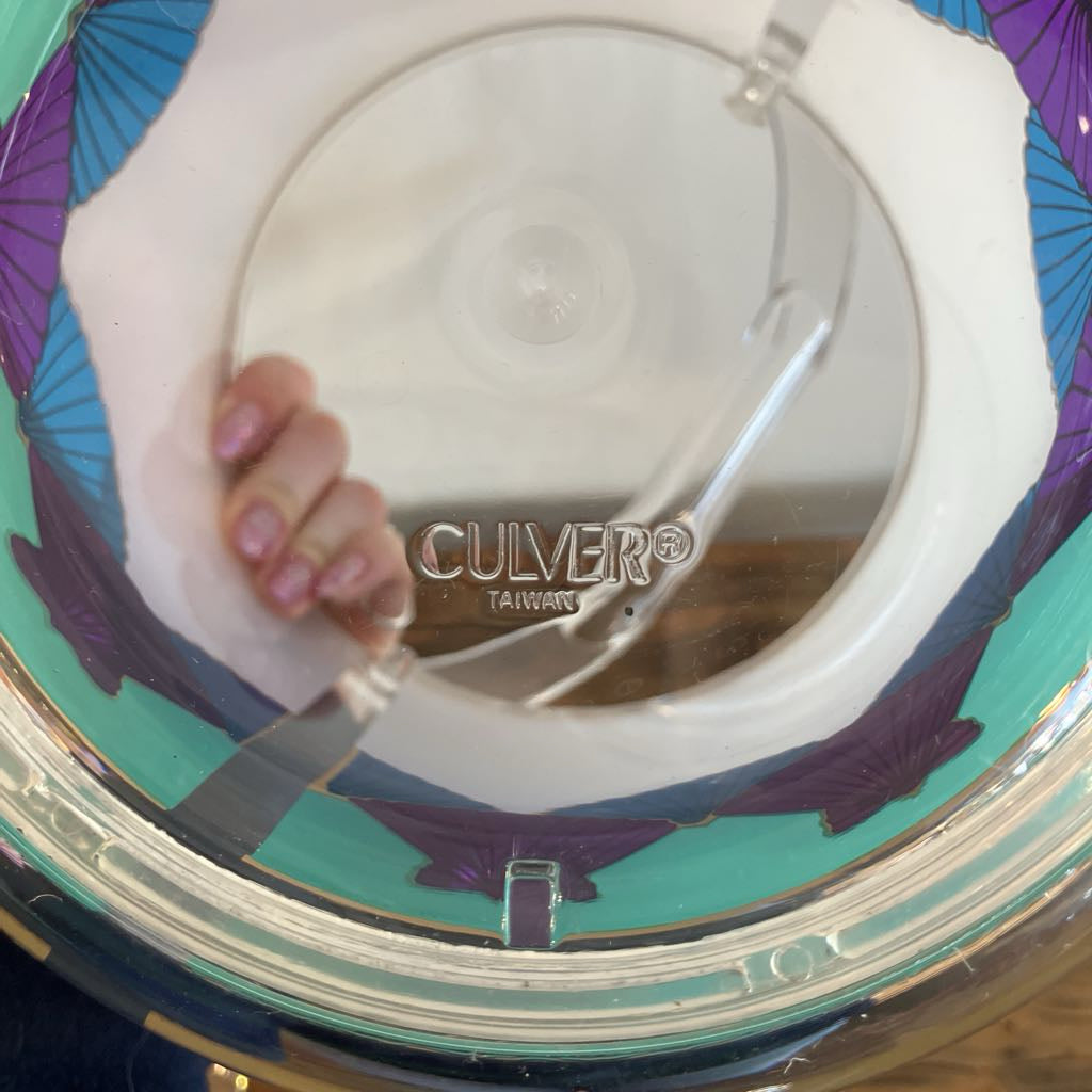Culver Taiwan product with a hand holding the inside, on a colorful background