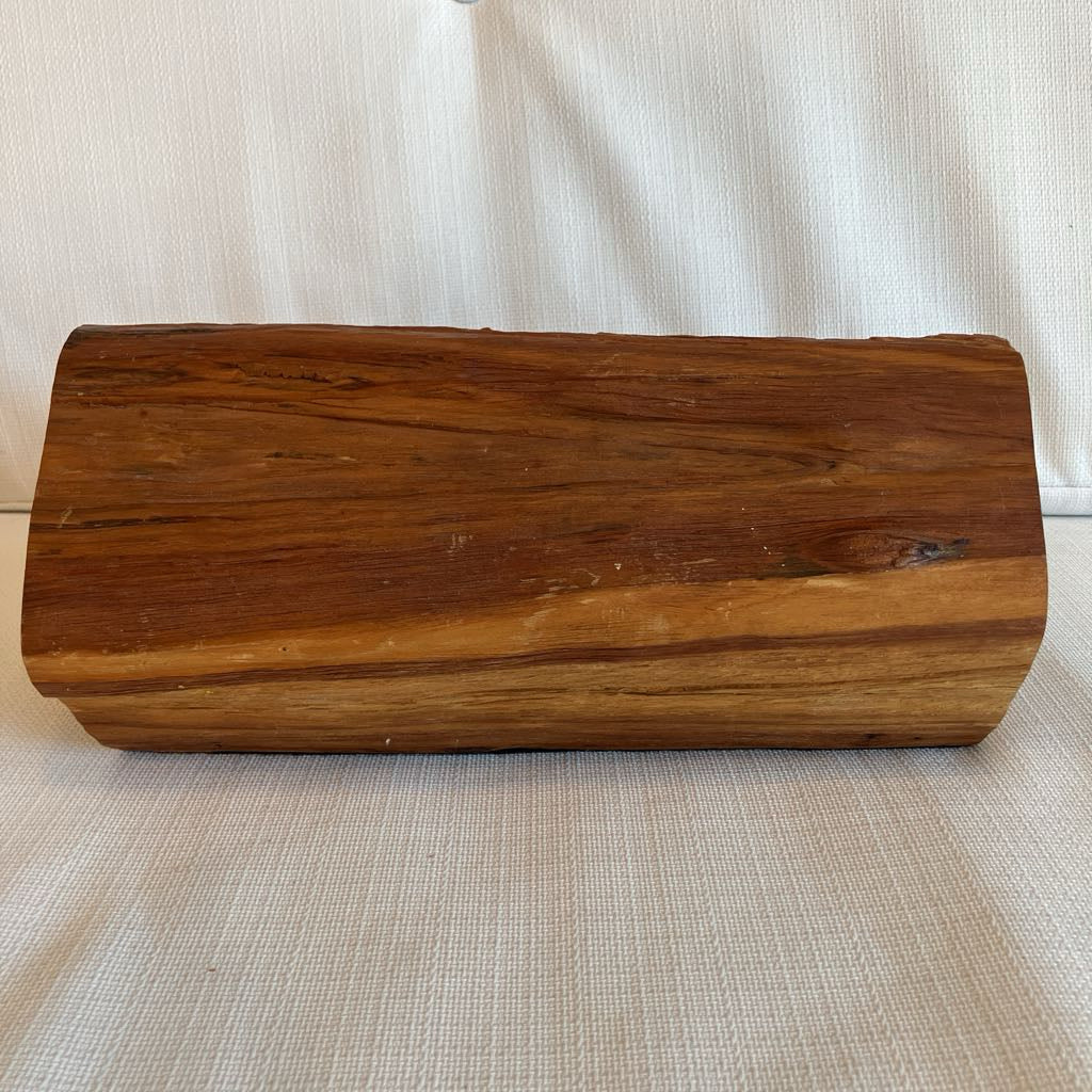 Wooden block on a textured surface