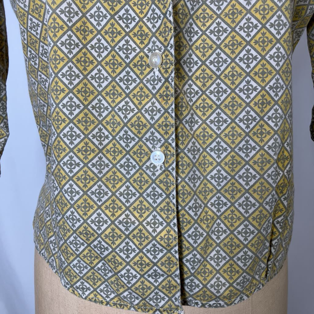 Patterned shirt with a geometric design on a plain background