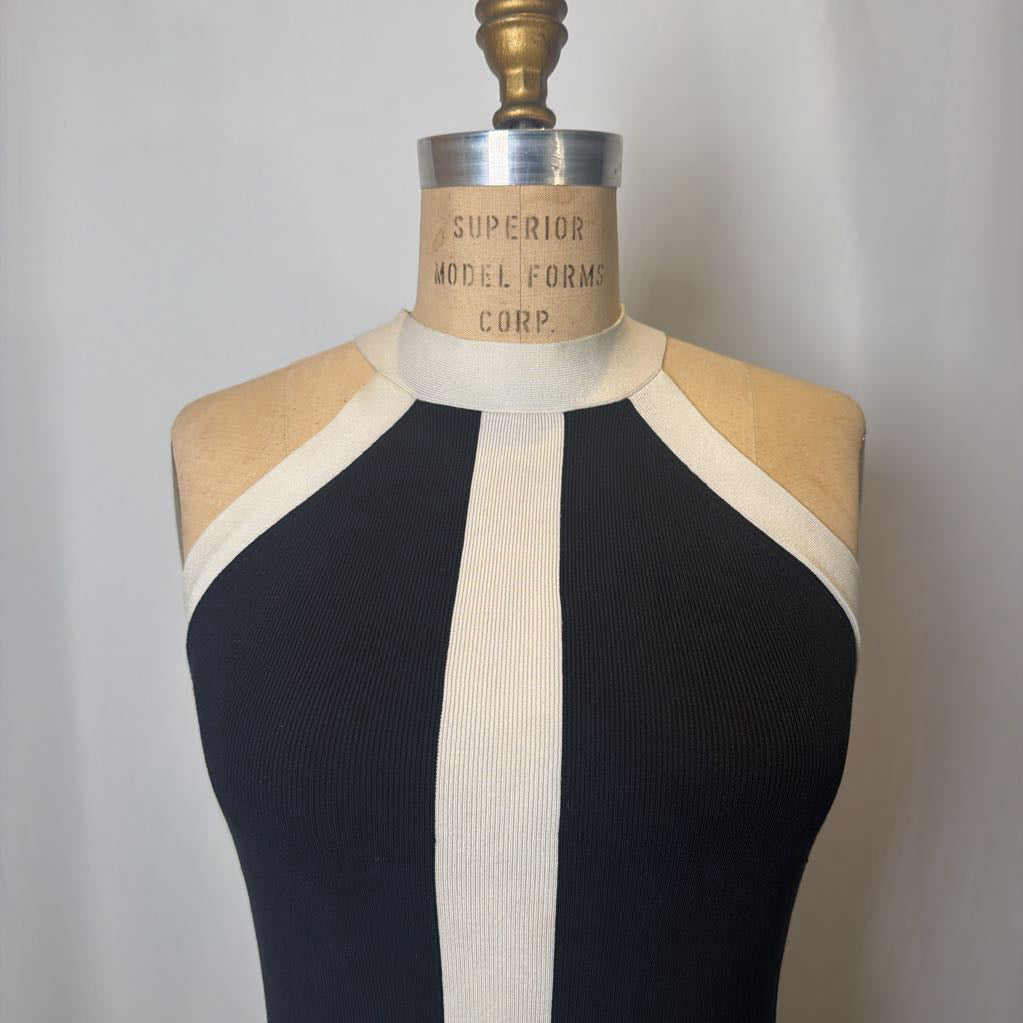 Black and white dress on a mannequin with 'Superior Model Forms Corp' label.