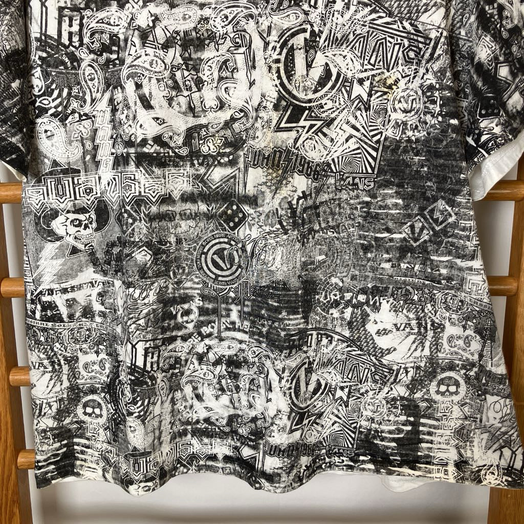 Black and white patterned fabric draped over a wooden chair