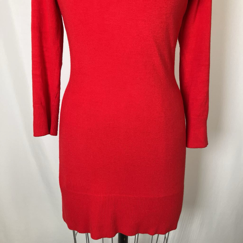 Red sweater dress on a mannequin against a white background