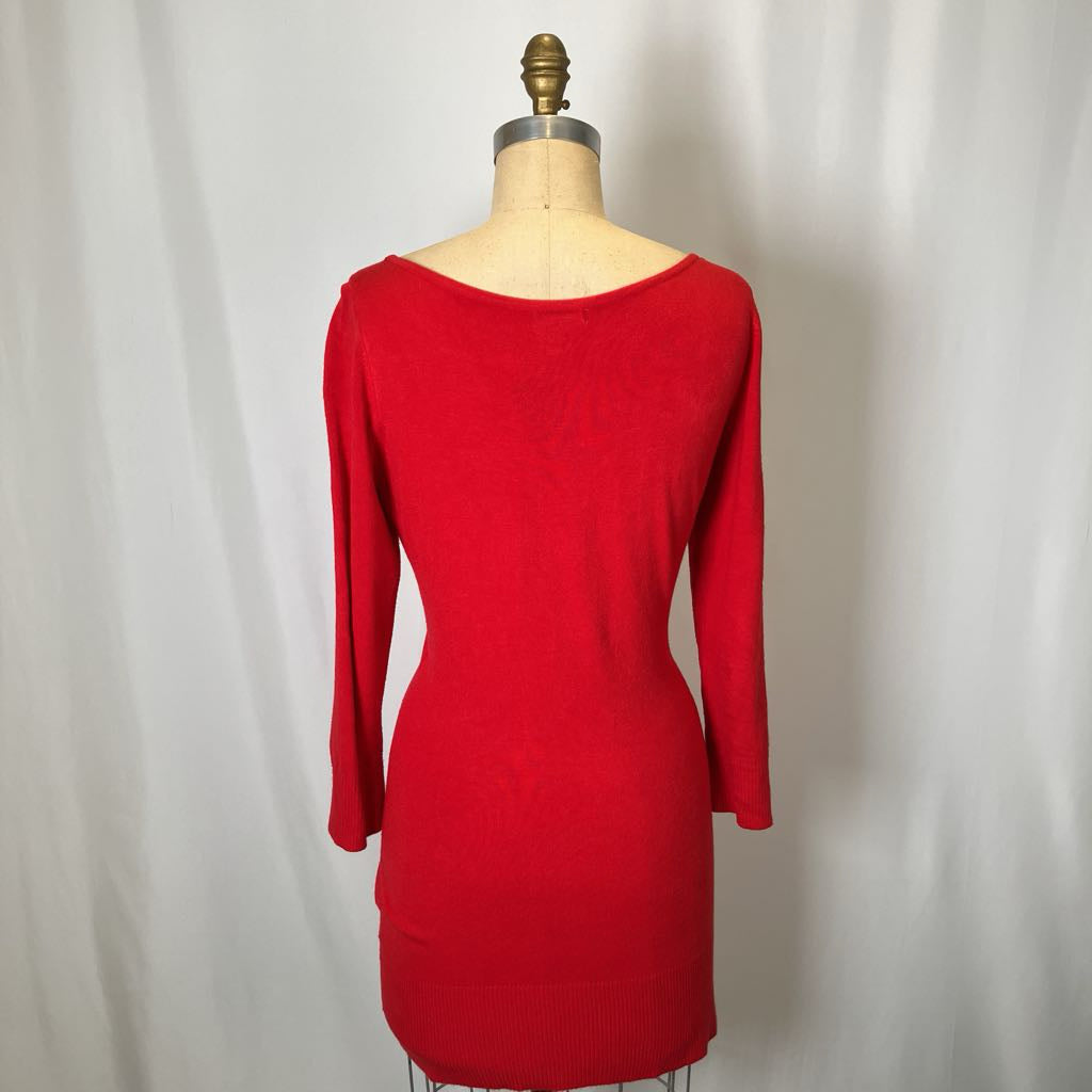 Red dress on a mannequin against a white background