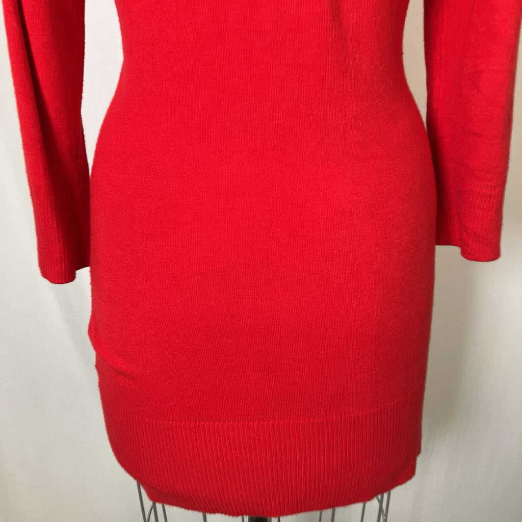 Red sweater dress on a mannequin against a plain background