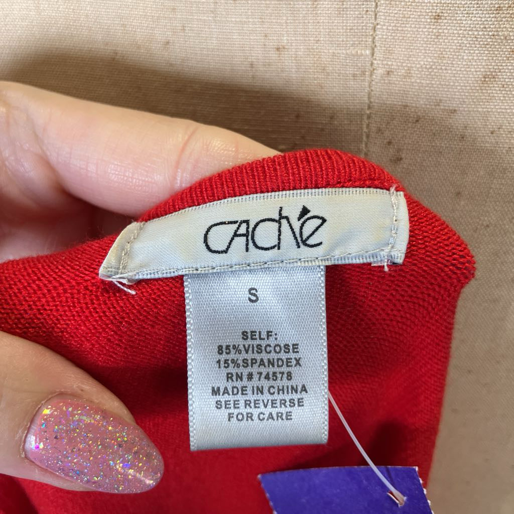 Red fabric with a Cachè label showing size S and material details.