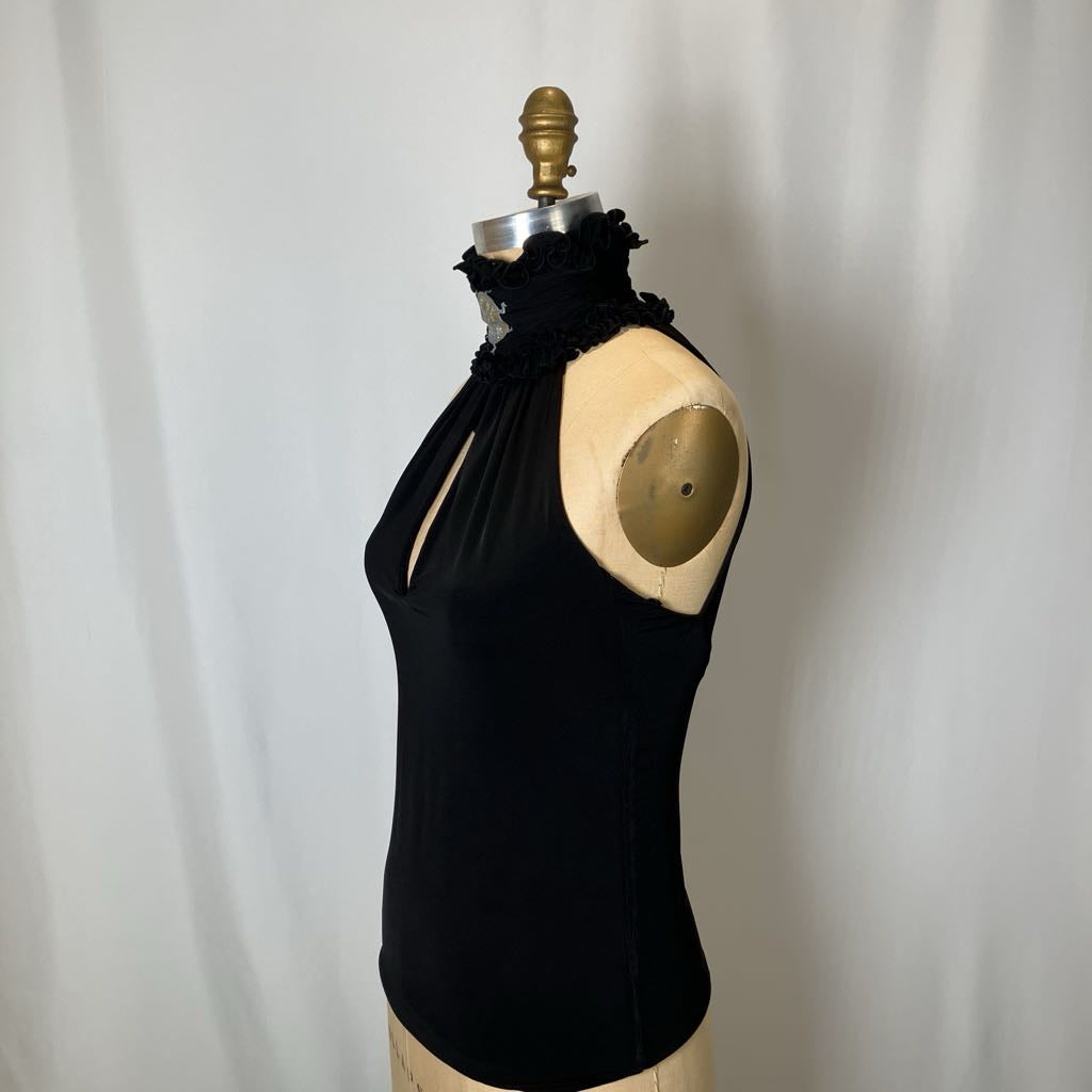 Black sleeveless top on a mannequin against a white background