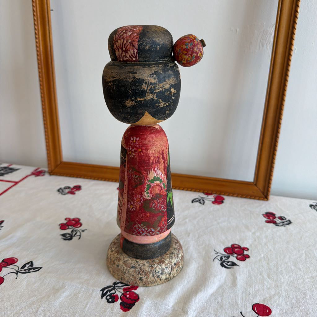back of Vintage Kokeshi doll made of wood and her head moves