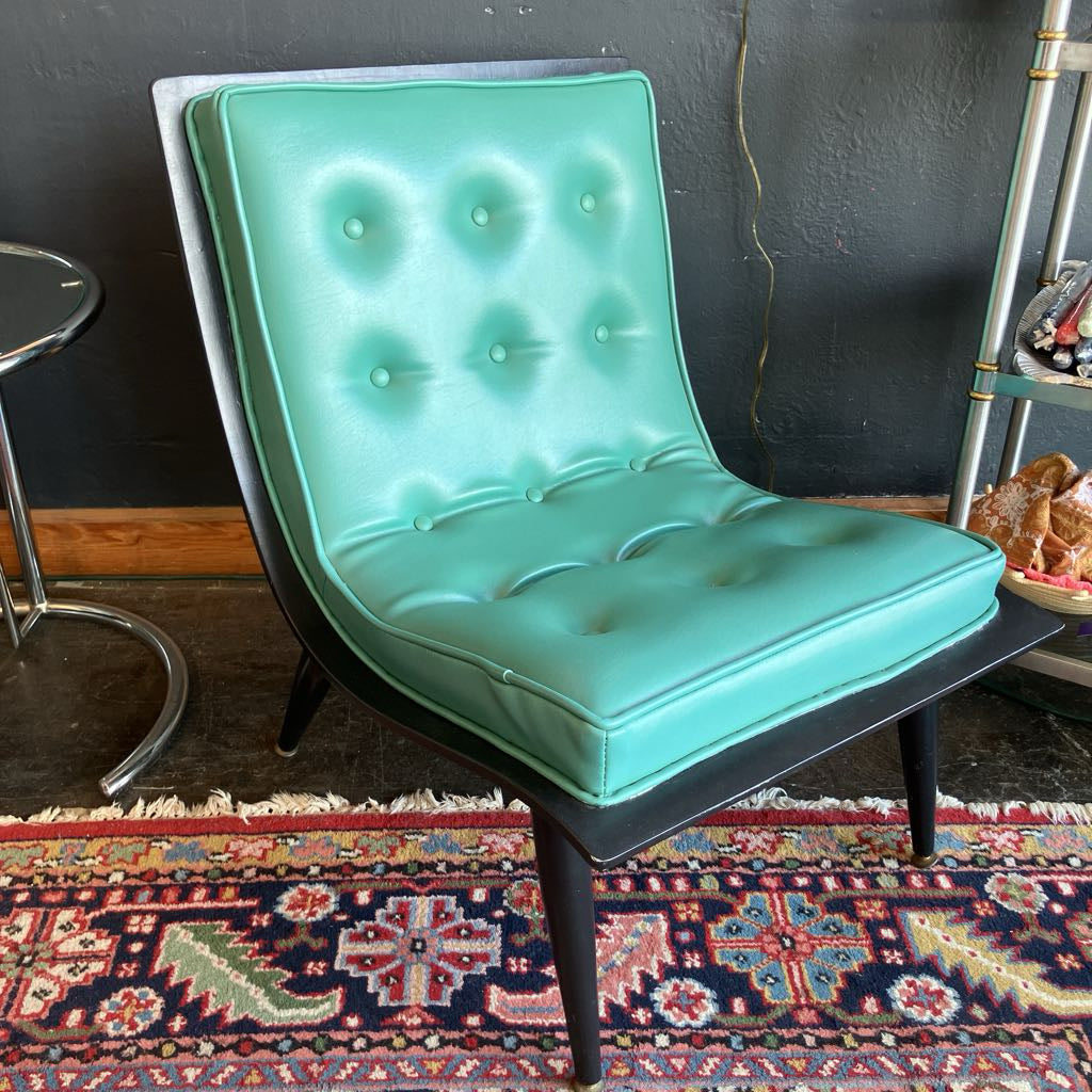 Turquoise tufted chair 