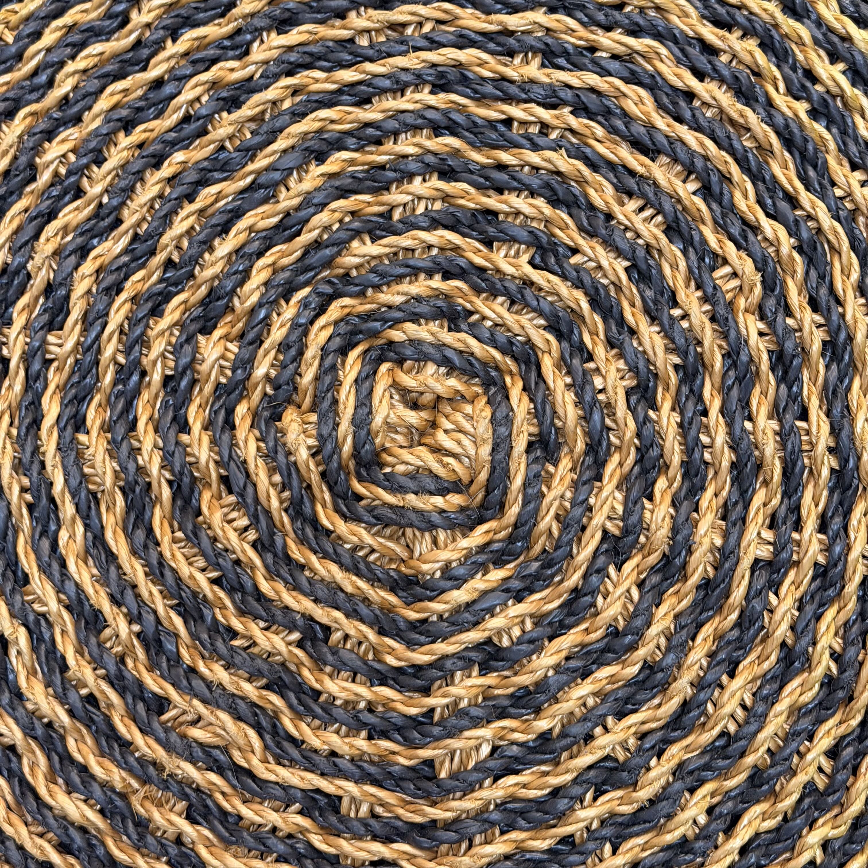 woven detailing of ottoman in a spiral
