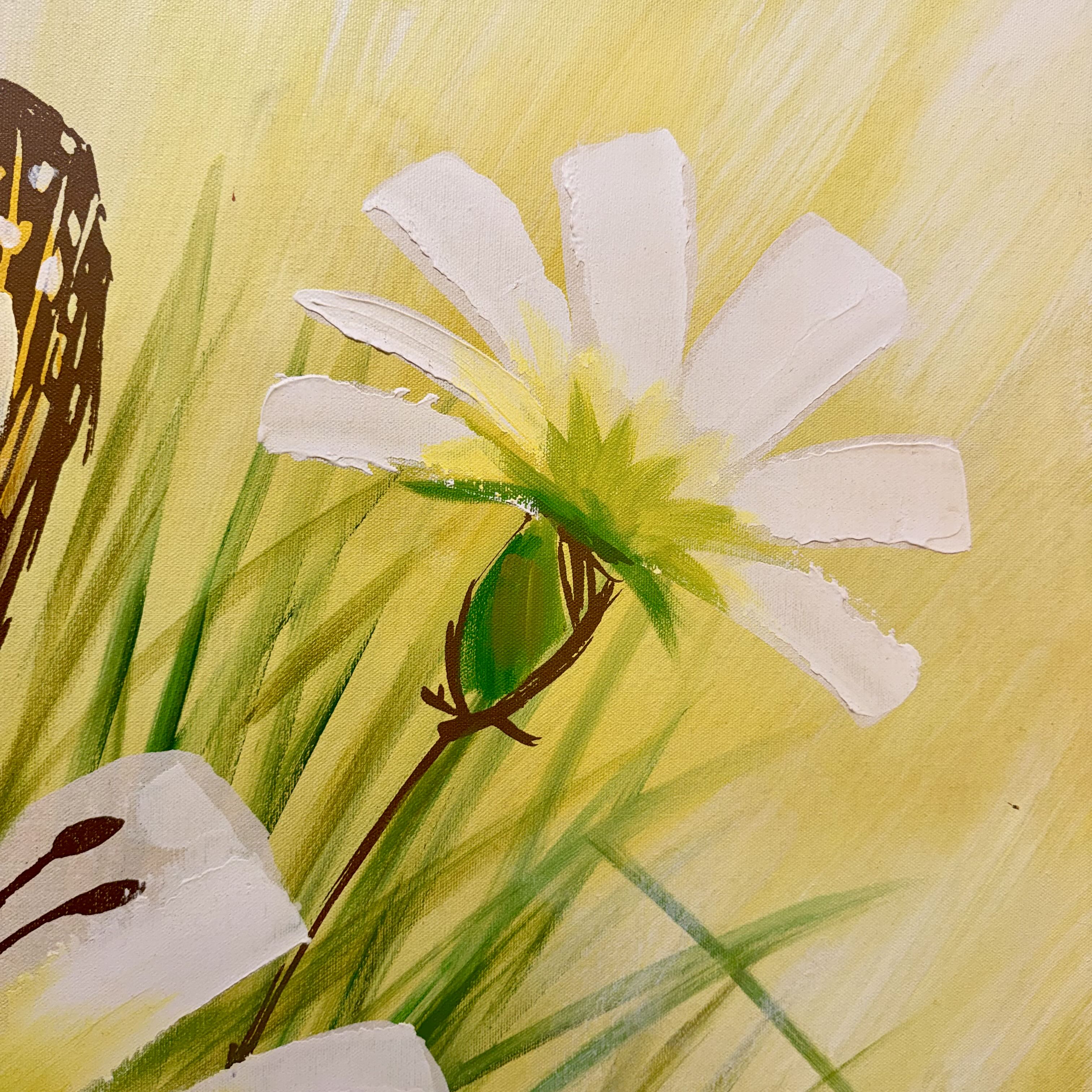 A close-up of a painted floral scene with a white flower featuring a yellow-green center, green grass-like strokes, and a warm yellow background.