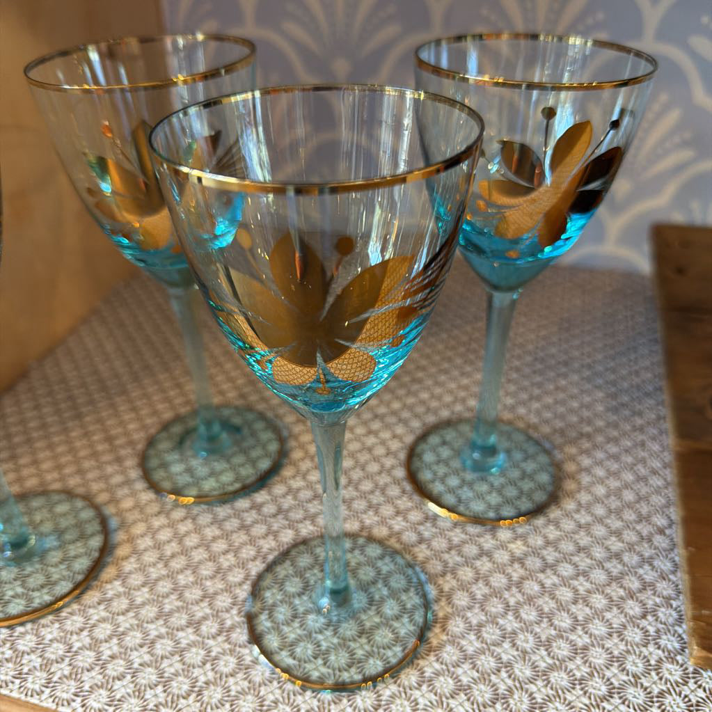 Set of four aqua and gold rim wine cordial classes