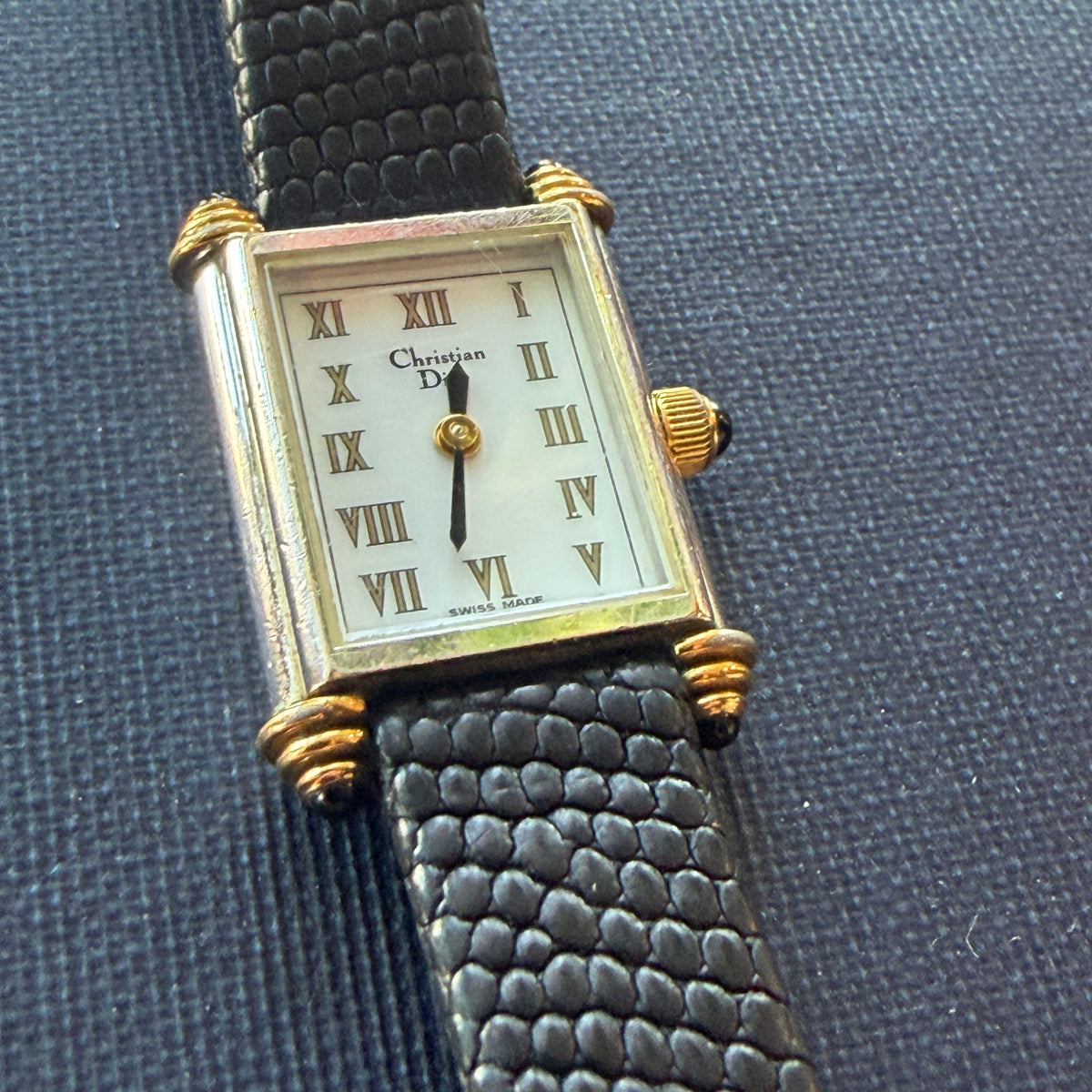 Showing the face of the Christian Dior tank watch