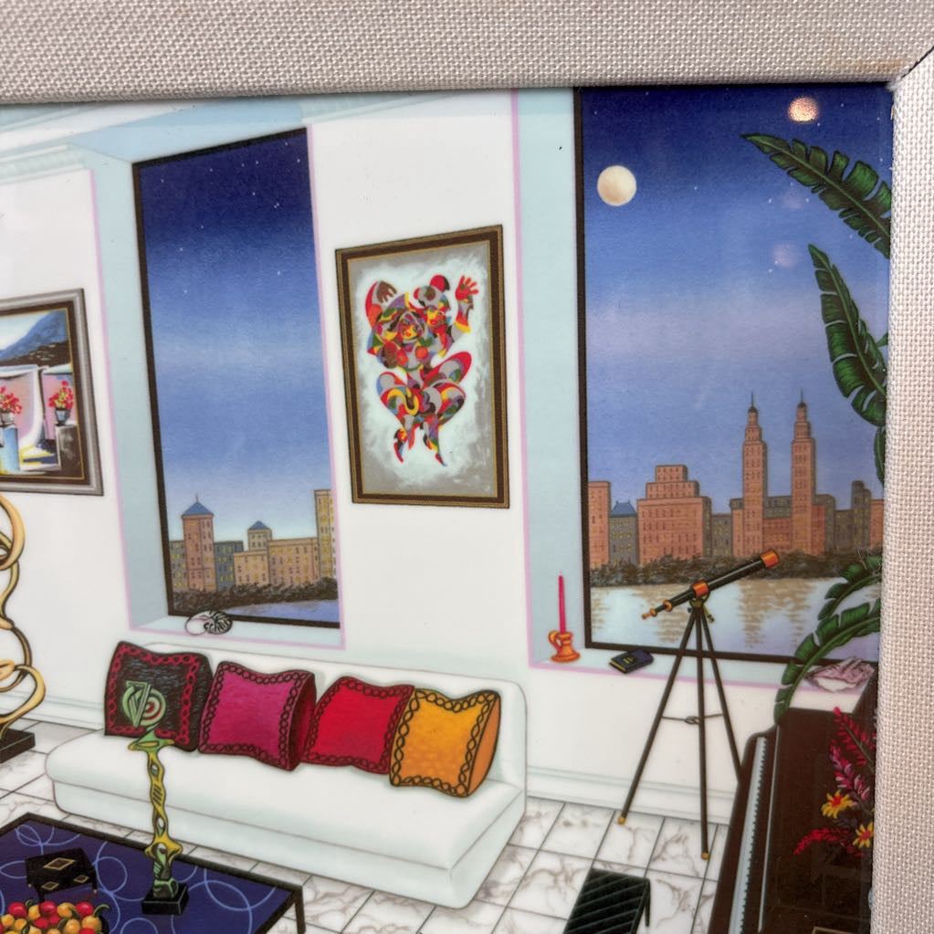 A framed artwork of a room and a nigh time cityscape outside of the windows. 